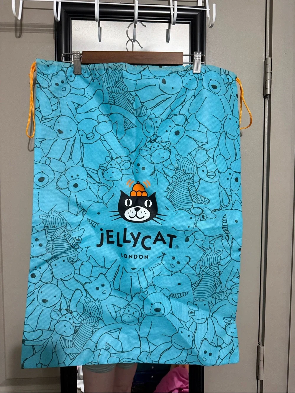 Jellycat Bright Aqua Drawstring Bag with Orange Accents
